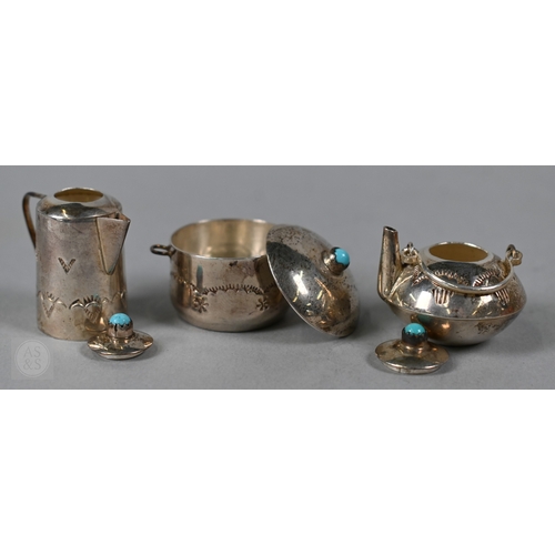 41 - A Navajo Sterling miniature coffee pot, kettle and cooking pot and cover with turquoise-set finial, ... 
