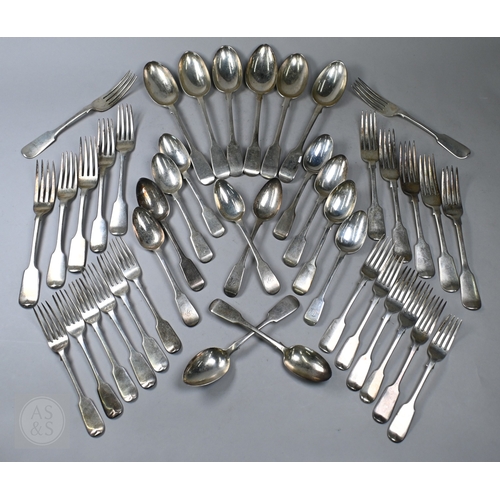 72 - A matched set of Georgian and later fiddle pattern flatware, comprising twelve each table forks and ...
