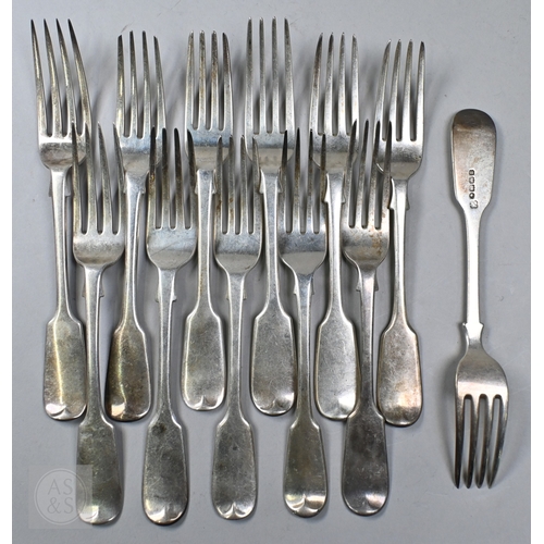 72 - A matched set of Georgian and later fiddle pattern flatware, comprising twelve each table forks and ... 