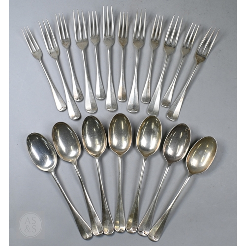 73 - A heavy quality matched set of Hanoverian flatware, including seven rat-tail serving spoons, six thr... 