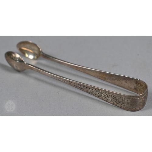 23A - A George III silver fiddle and thread caddy spoon with gilt shell bowl, William Eley I & William... 