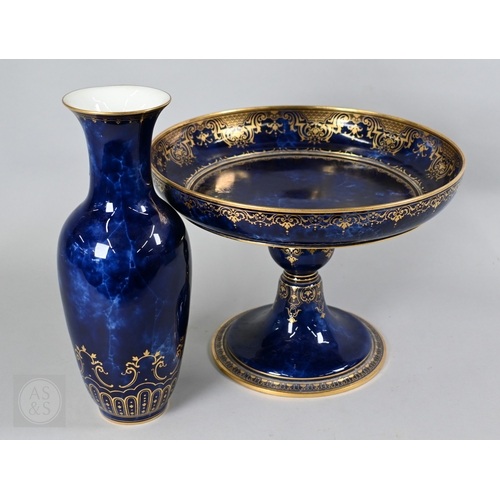 496 - A large Sèvres porcelain comport with revolving bowl top, decorated with gilding on a marbled blue g... 