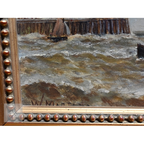 513 - W Martins? - Harbour view with lighthouse, oil on board, indistinctly signed lower left, 19 x 29 cm