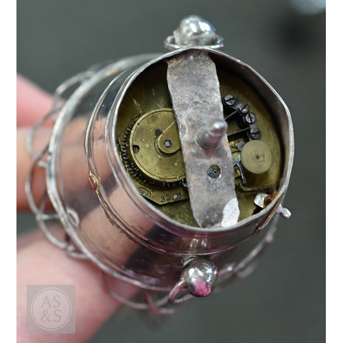42 - An antique Austro-Hungarian 13 lothige (.812 grade) novelty musical flower arrangement with clockwor... 