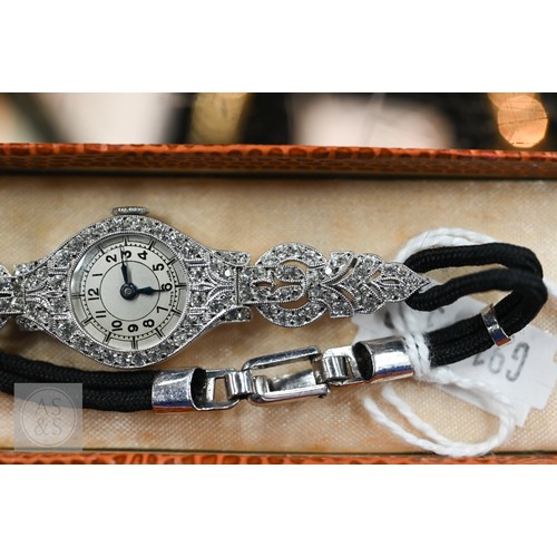 293 - An Art Deco platinum and diamond ladies cocktail watch, the Swiss MGM movement with circular Arabic ... 