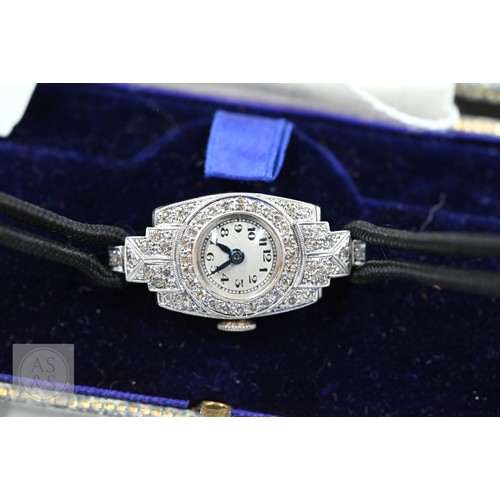 293 - An Art Deco platinum and diamond ladies cocktail watch, the Swiss MGM movement with circular Arabic ... 