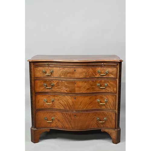 A Chippendale style satin mahogany serpentine chest, 19th century, the full width brush slide over four long graduated drawers, with brass swan-neck fittings and flanked by blind fret carved canted stiles, raised on shaped bracket feet, 97 cm x 55 cm x 89 cm h of drawers, bears retailers plate to verso for Brown Muff & Co., Bradford
