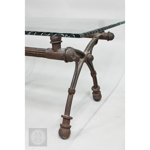 642 - An aged Regency style cast iron coffee table with feather edged plate glass top, 111 cm x 73 cm x 49... 