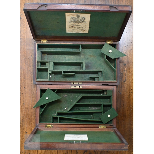 583 - Two 19th century mahogany pistol-cases with fitted baize linings, labels for Wilkinson & Son, Pa... 