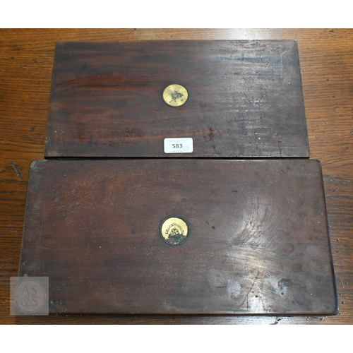 583 - Two 19th century mahogany pistol-cases with fitted baize linings, labels for Wilkinson & Son, Pa... 