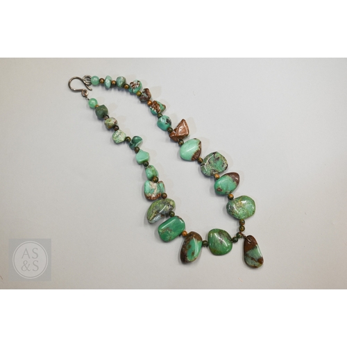 470 - A hardstone and iridescent ammonite necklace, a lapis lazuli bead necklace and a green chalcedony st... 