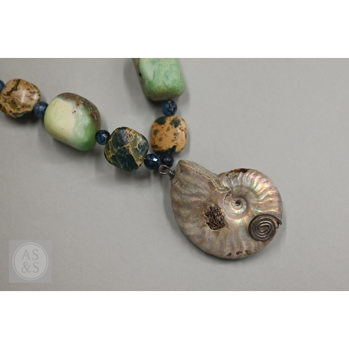 470 - A hardstone and iridescent ammonite necklace, a lapis lazuli bead necklace and a green chalcedony st... 