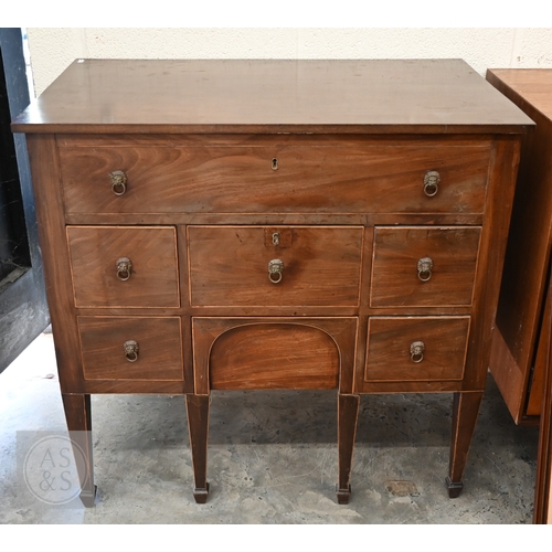 377 - A 19th century mahogany dressing table with hinged top enclosing velvet lined interior over six smal... 