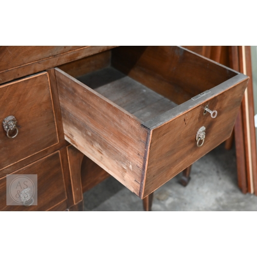 377 - A 19th century mahogany dressing table with hinged top enclosing velvet lined interior over six smal... 