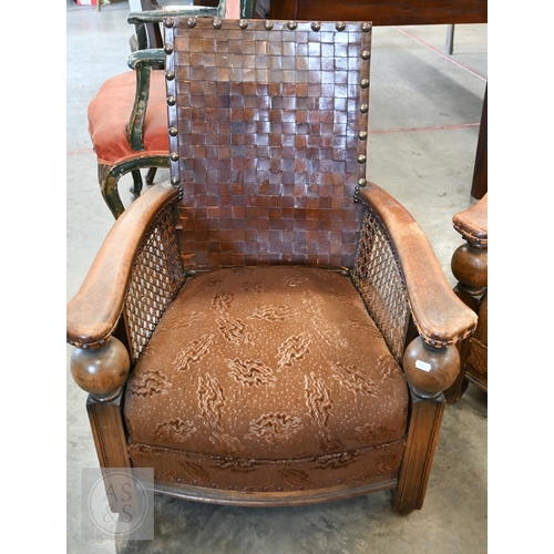 59 - A pair of oak and leather bergere armchairs (2)