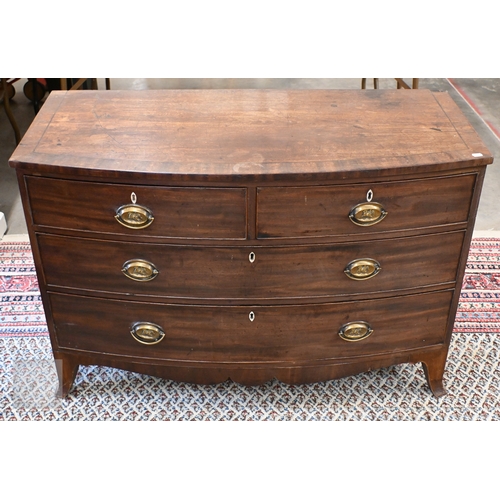 112 - A 19th century mahogany bowfront chest of two short over two long drawers with embossed brass 'horse... 