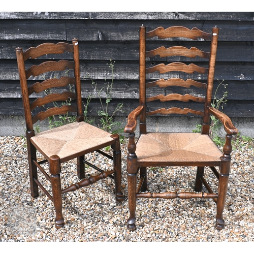 114 - A set of eight ash framed provincial wavy ladderback dining chairs with woven rush seats (6 + 2)