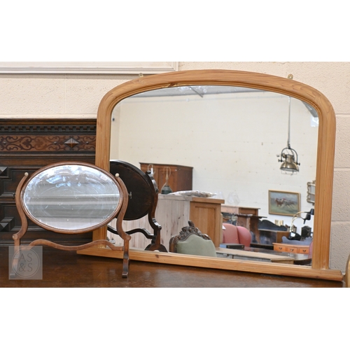 130 - A modern pine framed arched overmantel mirror, 102 cm wide x 74 cm high to/w Victorian mahogany fram... 