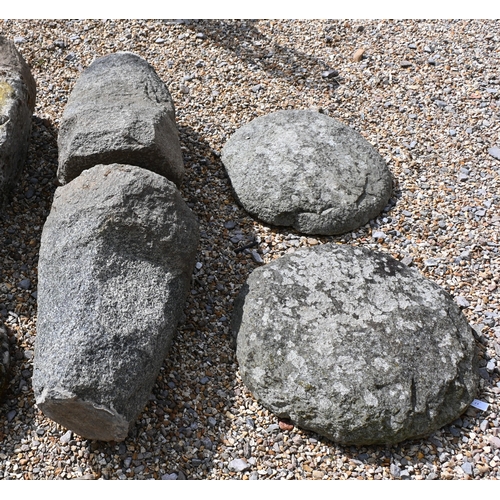 17 - A pair of antique rough hewn and weathered granite staddle stone, with circular caps, a/f (2)