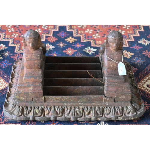 19 - An old cast iron twin 'Sphynx' mounted boot-scraper, no brushes