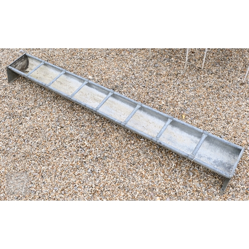27 - A galvanized eight bay feeding trough, as a planter, cm long