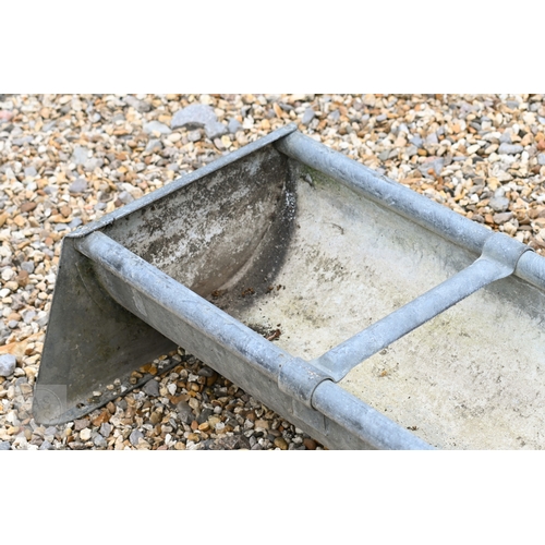 27 - A galvanized eight bay feeding trough, as a planter, cm long