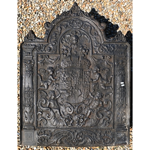 28 - A substantial 17th century style cast iron armorial fireback, 81 cm w x 107 cm h