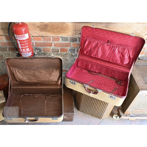 31 - A stack of five assorted vintage travel cases to/w a Lloyd Loom 'Lusty' laundry bin, gold