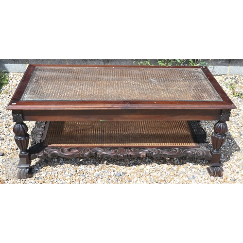 37 - A glass-topped Chippendale style coffee table with caned panel and conforming under tier, 139 cm x 7... 