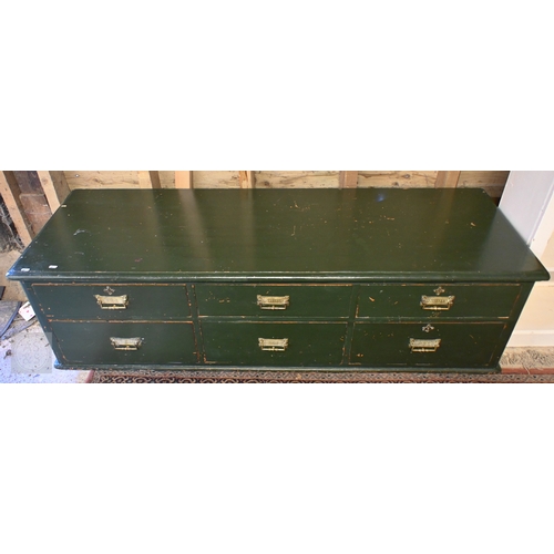 38 - A green painted low chest of 6 drawers, suitable as a window seat or coffee table, 162 cm x 54.5 cm ... 