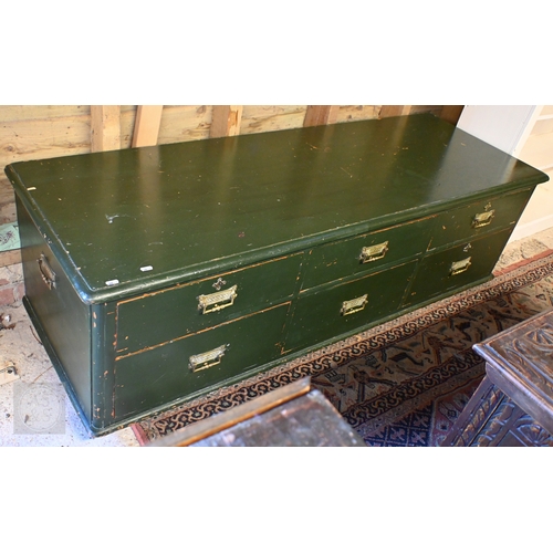 38 - A green painted low chest of 6 drawers, suitable as a window seat or coffee table, 162 cm x 54.5 cm ... 