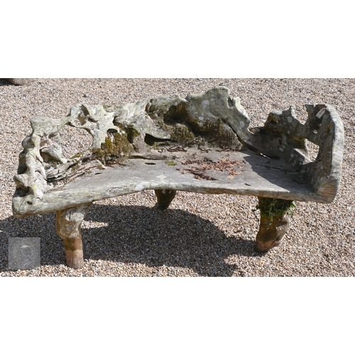 4 - An artisan sculptured solid teak root garden bench, weathered, 150 cm long