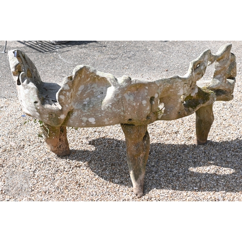 4 - An artisan sculptured solid teak root garden bench, weathered, 150 cm long