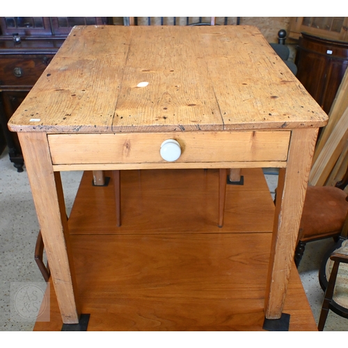 41 - An old stripped pine kitchen table, drawer to one end, raised on square section legs, 99 cm x 77 cm ... 