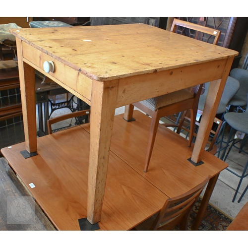 41 - An old stripped pine kitchen table, drawer to one end, raised on square section legs, 99 cm x 77 cm ... 
