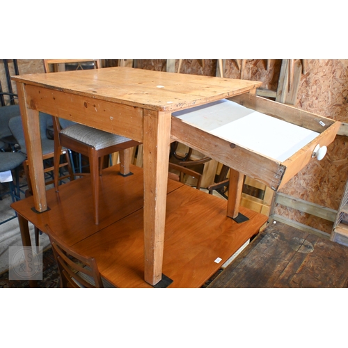 41 - An old stripped pine kitchen table, drawer to one end, raised on square section legs, 99 cm x 77 cm ... 