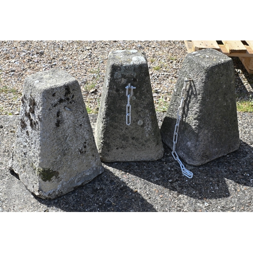 5 - A trio of tapering cast stone gate/door stops (3)