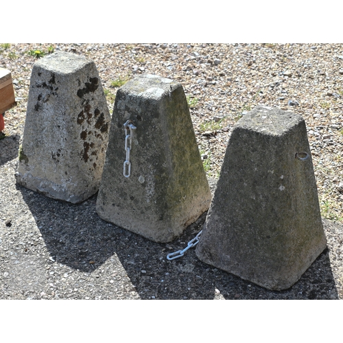 5 - A trio of tapering cast stone gate/door stops (3)