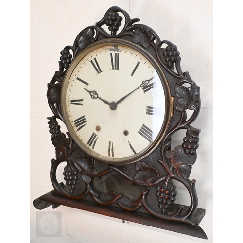56 - A mid 19th century leaf and vine carved wall clock, incomplete and a/f, 50 cm w x 58 cm h