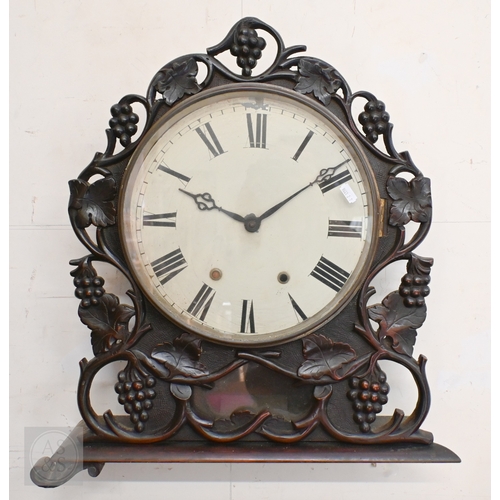 56 - A mid 19th century leaf and vine carved wall clock, incomplete and a/f, 50 cm w x 58 cm h