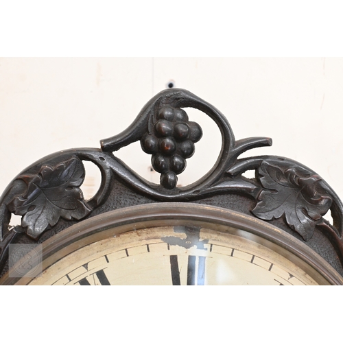 56 - A mid 19th century leaf and vine carved wall clock, incomplete and a/f, 50 cm w x 58 cm h