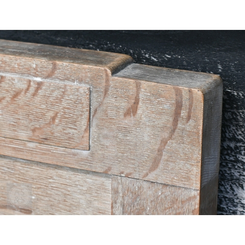 69 - Heal & Son, London - a limed oak mirror back dressing chest with four drawers, ivorine plaque to... 
