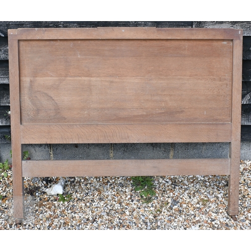 69 - Heal & Son, London - a limed oak mirror back dressing chest with four drawers, ivorine plaque to... 