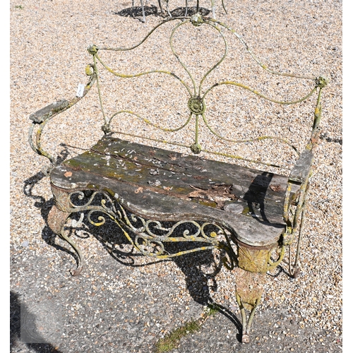 7 - An old weathered French wrought iron two seat garden bench with wood slat seat, 107 cm long, a/f