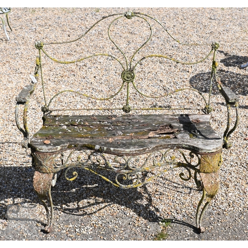 7 - An old weathered French wrought iron two seat garden bench with wood slat seat, 107 cm long, a/f