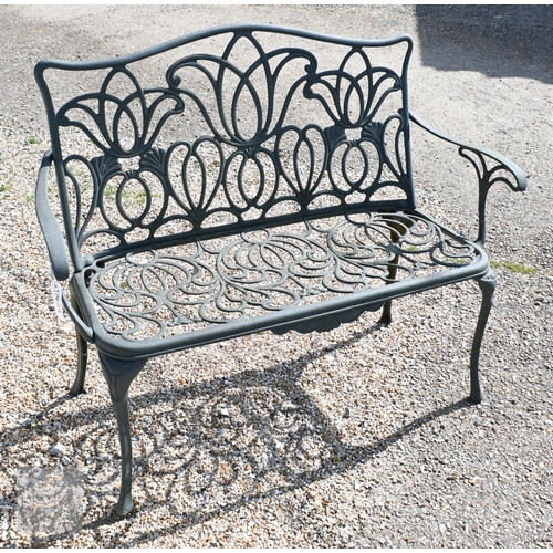 8 - A black painted alloy garden bench, 119 cm long
