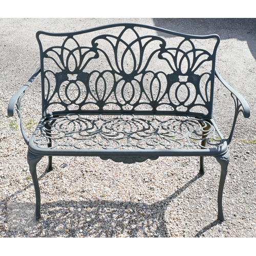 8 - A black painted alloy garden bench, 119 cm long