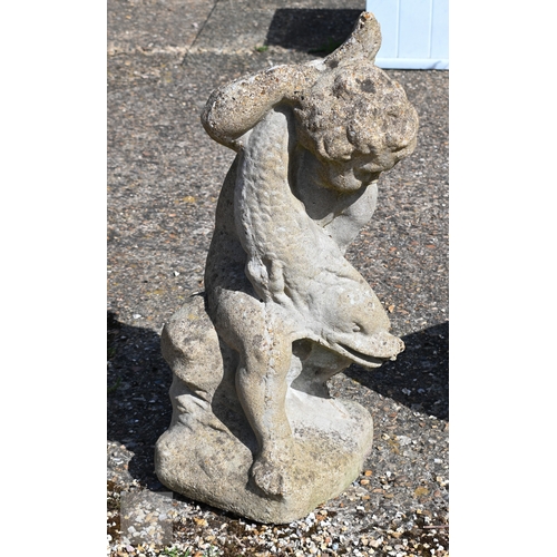 14 - A weathered Regency style cast stone putto and dolphin water feature, 74 cm h