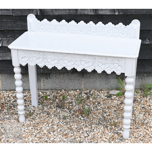 44 - An antique carved oak bureau later painted pale grey, with carved lion mask drawer pulls and 3/4 gal... 