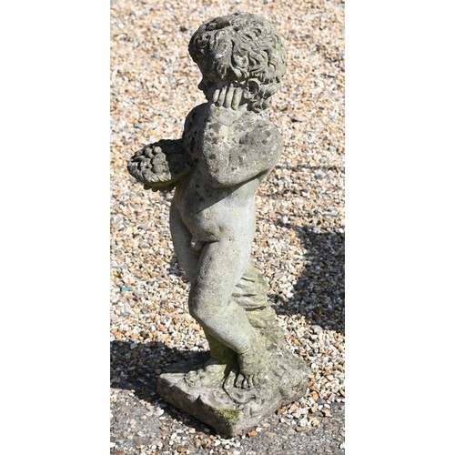 22 - A weathered cast stone statue of a cherub, 70 cm high